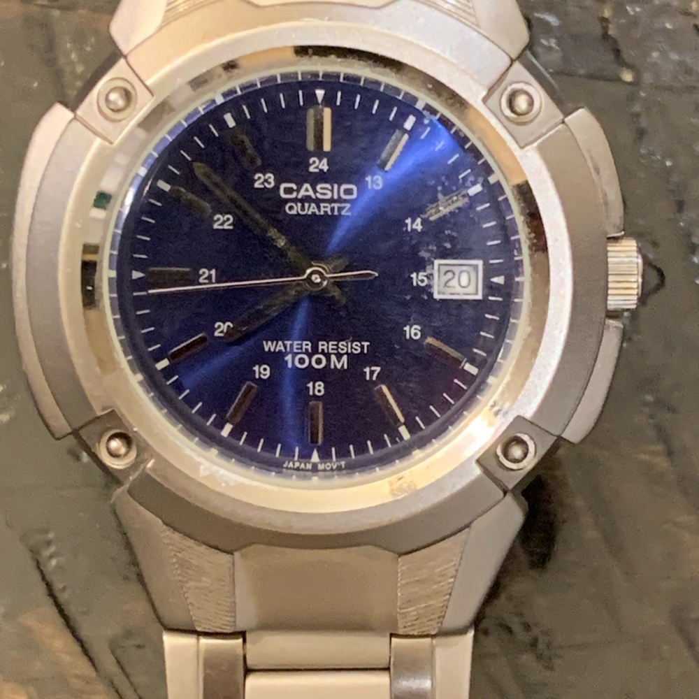 Casio Quartz Blue and Silver Watch